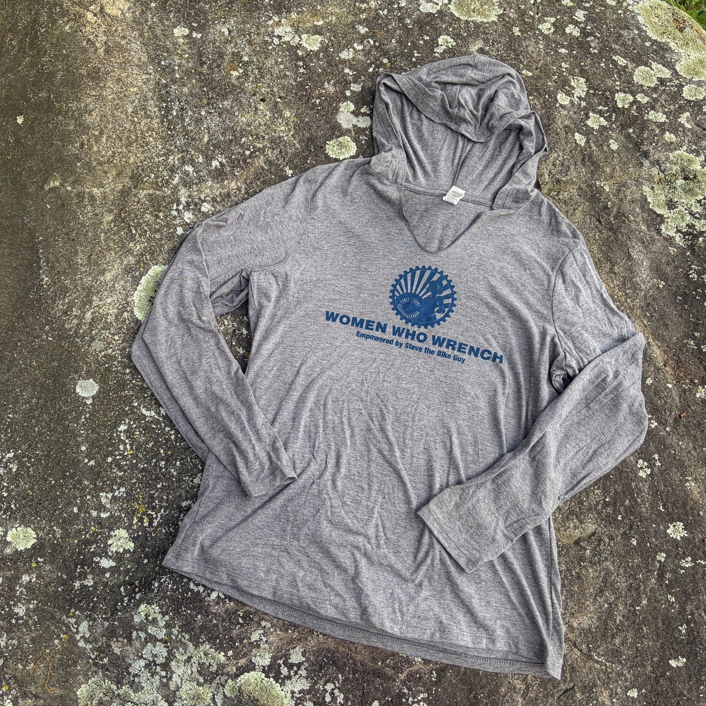 Grey jersey with imprint reading "Women Who Wrench"