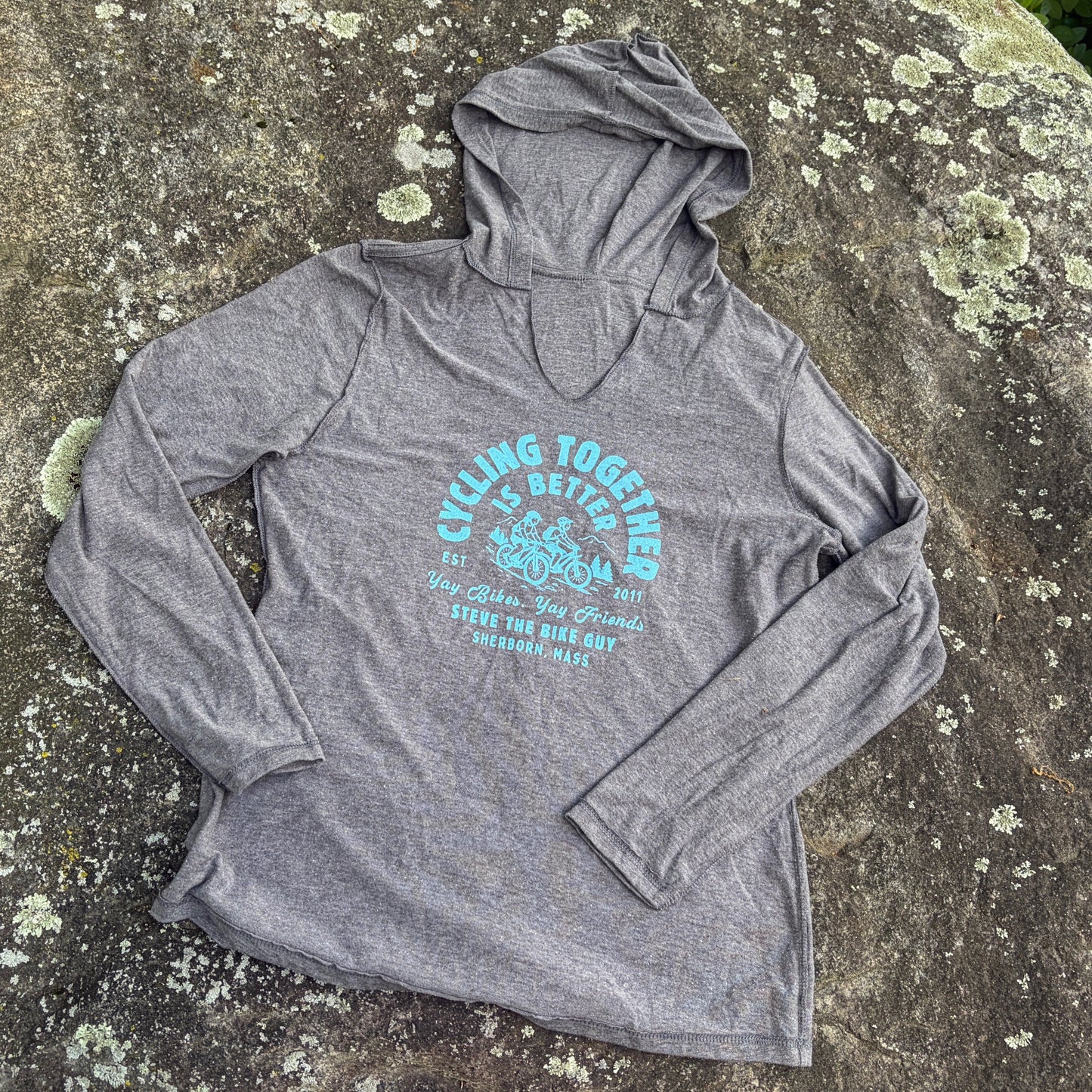 Grey long sleeve hoodie with imprint.
